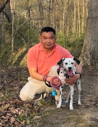 Page 214 founder with Amelia, his emotional support Dalmatian